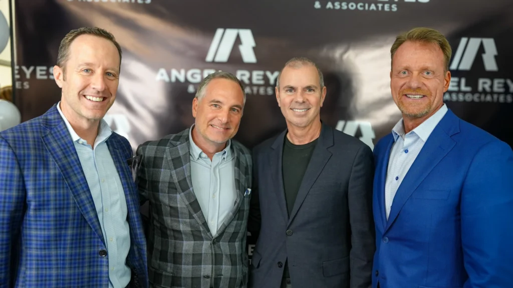 Photo of managing partners at the ribbon cutting event 
